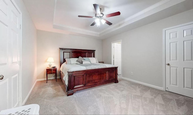 1503 Birchwood Cir, Franklin, TN 37064 - bedroom featuring light carpet, a tray ceiling, ornamental molding, and a ceiling fan
