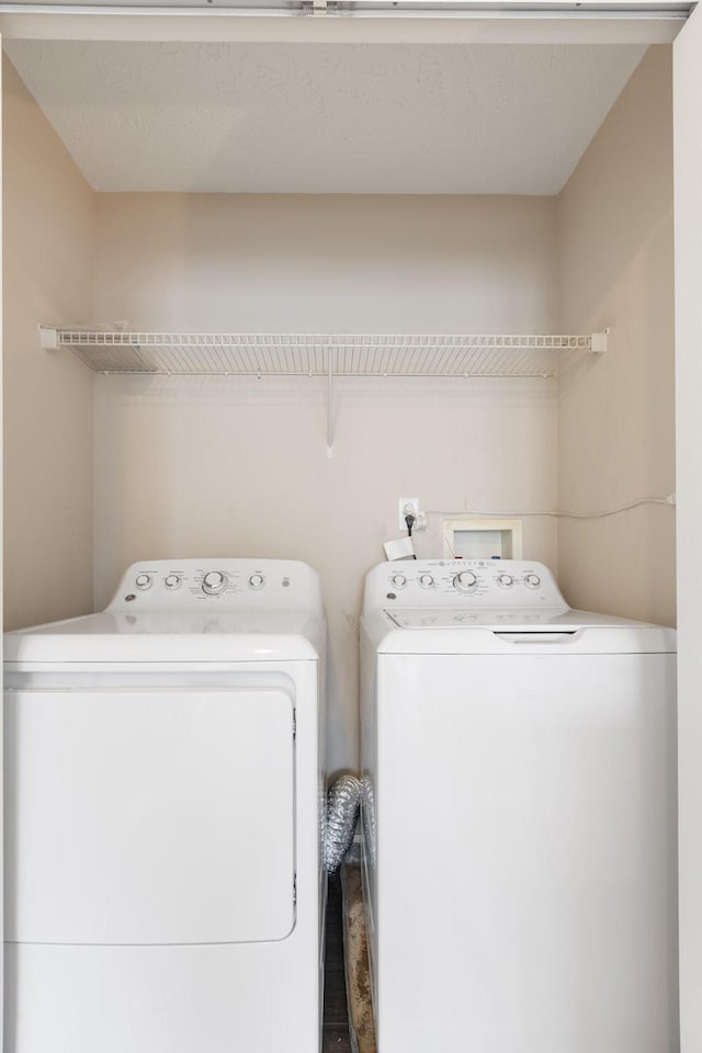 3904 Bridgeview Ln, Nashville, TN 37221 - laundry area with washing machine and clothes dryer