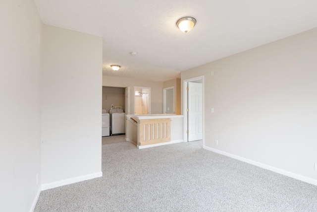 3904 Bridgeview Ln, Nashville, TN 37221 - empty room with washing machine and clothes dryer and light colored carpet