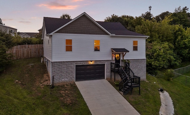 9407 Hackberry Ln, Soddy Daisy, TN 37379 - view of front of house featuring an attached garage and driveway