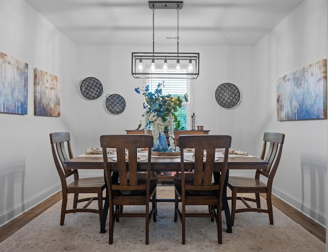 9407 Hackberry Ln, Soddy Daisy, TN 37379 - dining space featuring wood finished floors