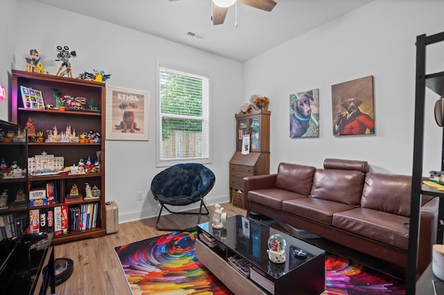 9407 Hackberry Ln, Soddy Daisy, TN 37379 - living room with ceiling fan and wood finished floors