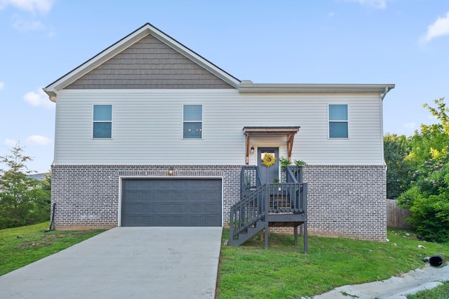 9407 Hackberry Ln, Soddy Daisy, TN 37379 - view of front of home featuring brick siding, driveway, and a garage