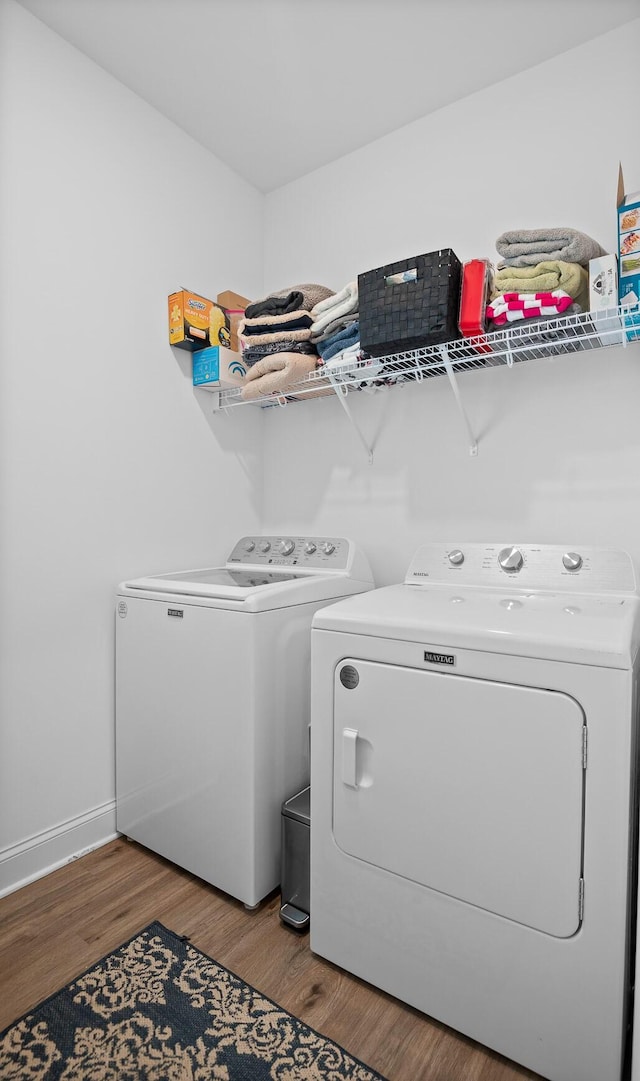 9407 Hackberry Ln, Soddy Daisy, TN 37379 - laundry room with independent washer and dryer and wood finished floors