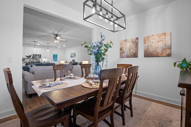 9407 Hackberry Ln, Soddy Daisy, TN 37379 - dining space featuring wood finished floors and a ceiling fan