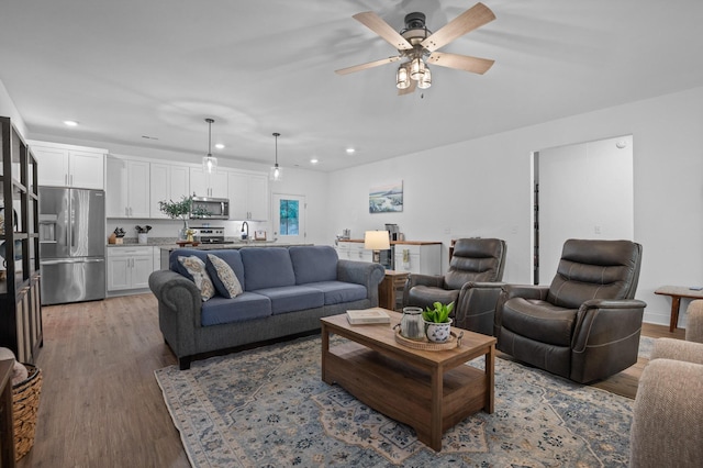 9407 Hackberry Ln, Soddy Daisy, TN 37379 - living room with recessed lighting, wood finished floors, and a ceiling fan
