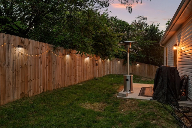 9407 Hackberry Ln, Soddy Daisy, TN 37379 - yard at dusk featuring a fenced backyard