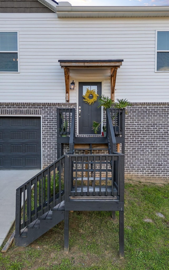 9407 Hackberry Ln, Soddy Daisy, TN 37379 - entrance to property featuring brick siding and an attached garage