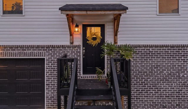 9407 Hackberry Ln, Soddy Daisy, TN 37379 - entrance to property featuring a garage and brick siding