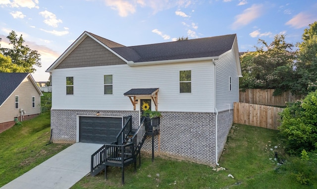 9407 Hackberry Ln, Soddy Daisy, TN 37379 - view of front of property featuring driveway, a garage, brick siding, and stairs