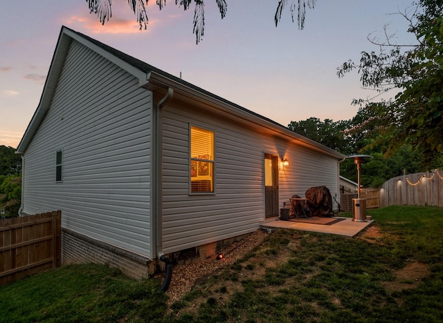 9407 Hackberry Ln, Soddy Daisy, TN 37379 - property exterior at dusk featuring a patio