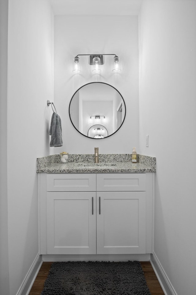 9407 Hackberry Ln, Soddy Daisy, TN 37379 - bathroom with wood finished floors and vanity