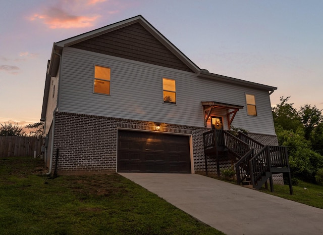 9407 Hackberry Ln, Soddy Daisy, TN 37379 - view of front of property with brick siding, an attached garage, and concrete driveway