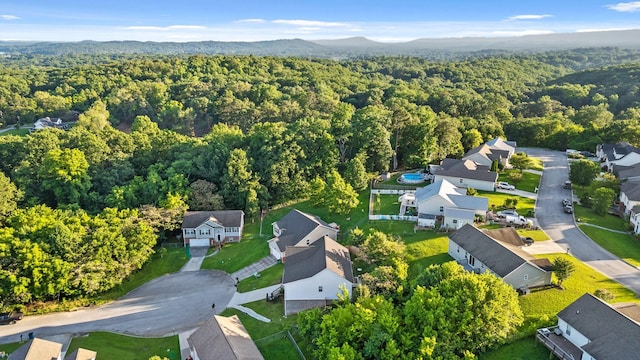 9407 Hackberry Ln, Soddy Daisy, TN 37379 - aerial view of residential area featuring a heavily wooded area