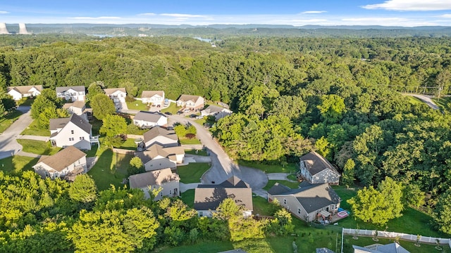 9407 Hackberry Ln, Soddy Daisy, TN 37379 - aerial overview of property's location featuring a forest and nearby suburban area