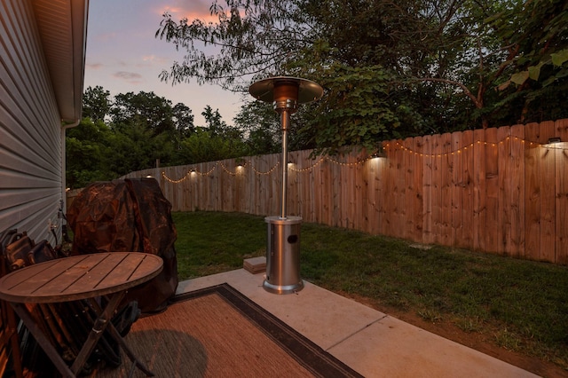 9407 Hackberry Ln, Soddy Daisy, TN 37379 - yard at dusk featuring a fenced backyard and a patio