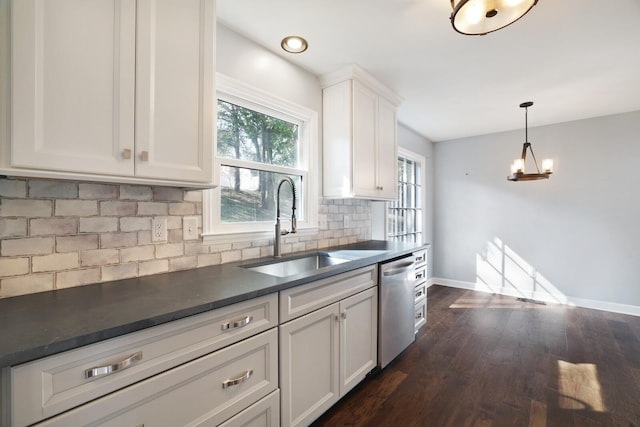 117 Fitzpatrick Ct, Nashville, TN 37214 - kitchen featuring stainless steel dishwasher, dark countertops, white cabinetry, dark wood-type flooring, and backsplash
