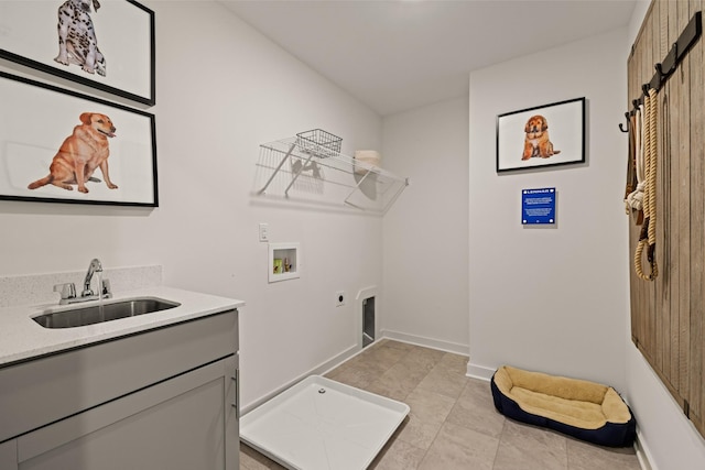 582 Gingerwood Ln, Hendersonville, TN 37075 - washroom with electric dryer hookup, cabinet space, washer hookup, and light tile patterned floors