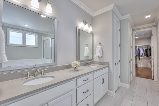 232 Moray Ct, Franklin, TN 37064 - full bath with double vanity, ornamental molding, a spacious closet, a shower with shower door, and recessed lighting