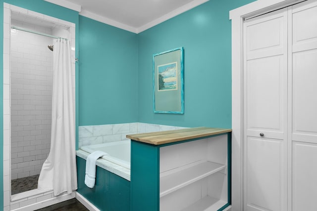 9311 Scenic Hwy, Lookout Mountain, GA 30750 - full bathroom with a tile shower, a garden tub, ornamental molding, and a closet