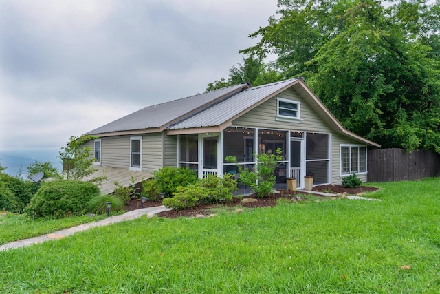 9311 Scenic Hwy, Lookout Mountain, GA 30750 - view of front of property featuring a sunroom, a metal roof, and a wooden deck