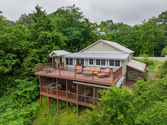 9311 Scenic Hwy, Lookout Mountain, GA 30750 - rear view of house with a wooden deck, a metal roof, and a view of trees