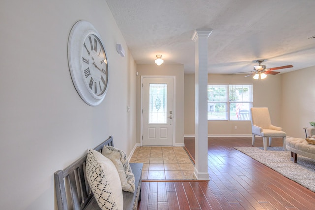 5451 Middlebury Dr, Murfreesboro, TN 37128 - foyer entrance with hardwood / wood-style flooring, a ceiling fan, and a textured ceiling
