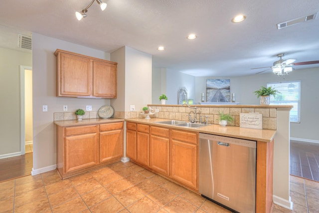 5451 Middlebury Dr, Murfreesboro, TN 37128 - kitchen with dishwasher, a peninsula, recessed lighting, a ceiling fan, and tasteful backsplash