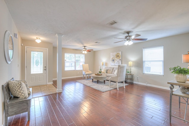5451 Middlebury Dr, Murfreesboro, TN 37128 - living room featuring decorative columns, wood finished floors, and a ceiling fan