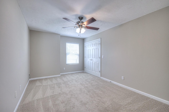 5451 Middlebury Dr, Murfreesboro, TN 37128 - unfurnished room with a ceiling fan, light carpet, and a textured ceiling