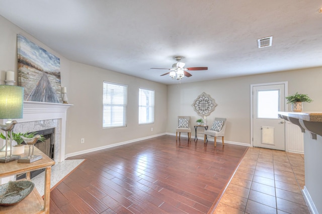 5451 Middlebury Dr, Murfreesboro, TN 37128 - sitting room with a ceiling fan, a high end fireplace, and wood finished floors