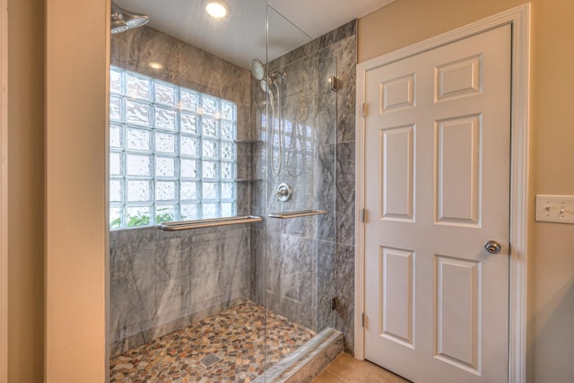 5451 Middlebury Dr, Murfreesboro, TN 37128 - bathroom featuring tiled shower and tile patterned floors