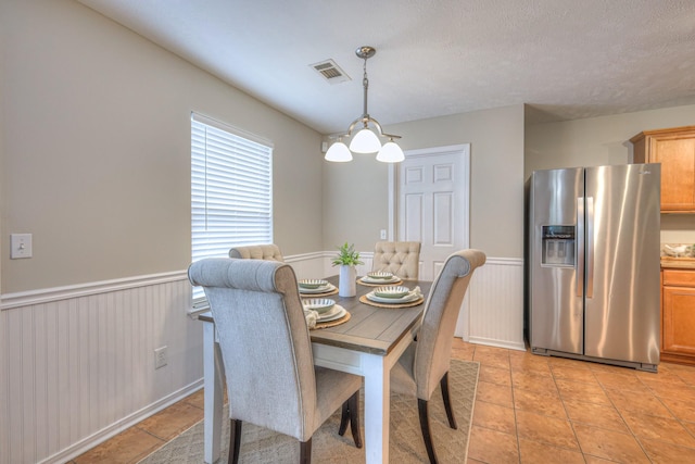 5451 Middlebury Dr, Murfreesboro, TN 37128 - dining room with a wainscoted wall and light tile patterned floors