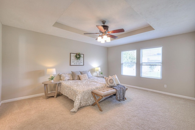 5451 Middlebury Dr, Murfreesboro, TN 37128 - bedroom with a tray ceiling, light colored carpet, and ceiling fan