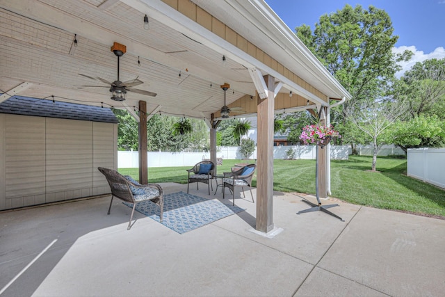 5451 Middlebury Dr, Murfreesboro, TN 37128 - fenced backyard with ceiling fan and a patio