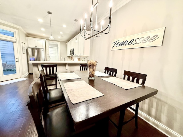 7040 Wenlock Ln, Franklin, TN 37064 - dining area featuring crown molding, a chandelier, dark wood-style floors, and recessed lighting