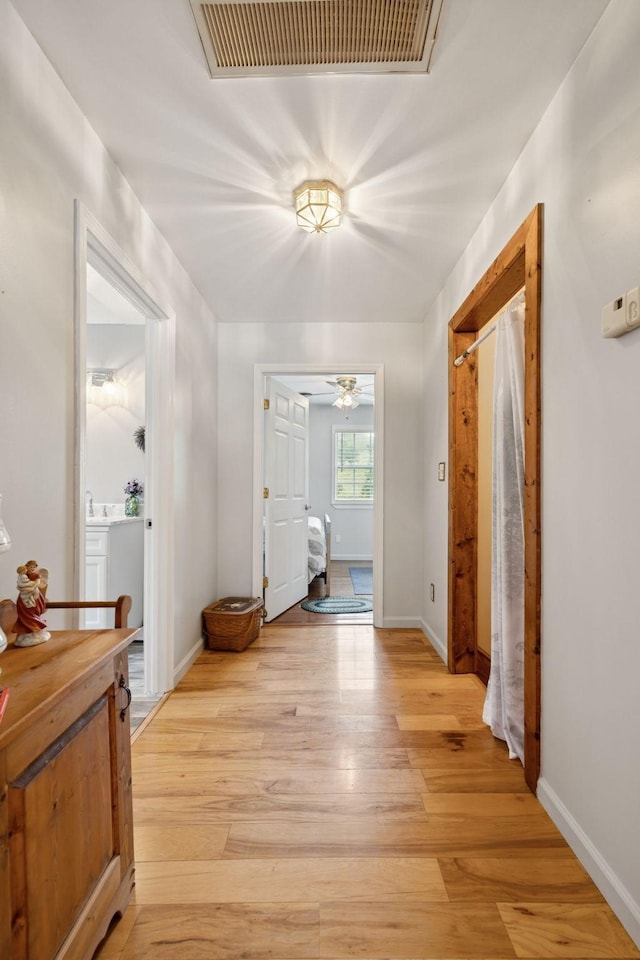 32 Morris Ln, Pleasant Shade, TN 37145 - hall featuring light wood-style floors and baseboards