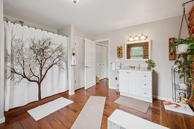 32 Morris Ln, Pleasant Shade, TN 37145 - full bathroom with vanity and wood finished floors