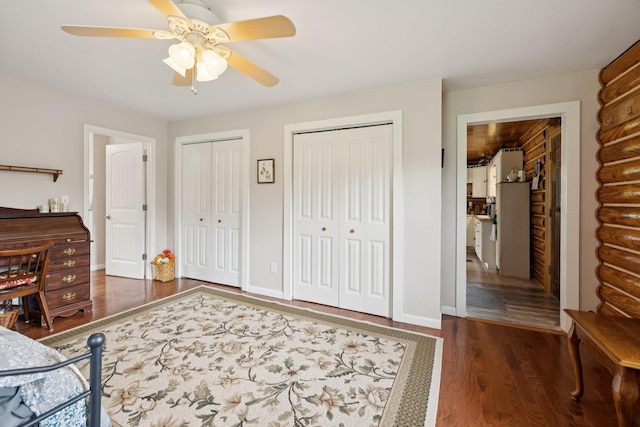32 Morris Ln, Pleasant Shade, TN 37145 - bedroom featuring wood finished floors, two closets, and ceiling fan