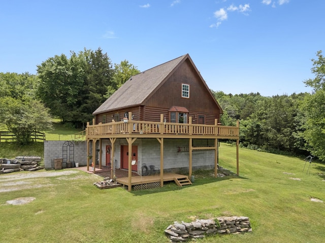 32 Morris Ln, Pleasant Shade, TN 37145 - rear view of house with a deck, a lawn, log exterior, and a wooded view