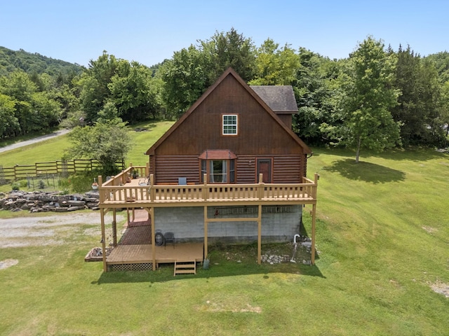 32 Morris Ln, Pleasant Shade, TN 37145 - rear view of house featuring log exterior, a deck, and a wooded view