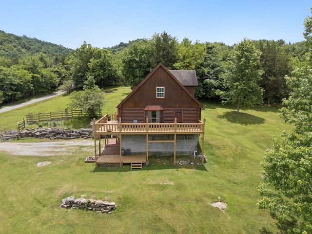 32 Morris Ln, Pleasant Shade, TN 37145 - rear view of house with a deck, a forest view, and log siding