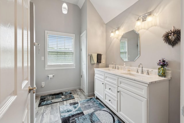 32 Morris Ln, Pleasant Shade, TN 37145 - full bathroom with double vanity, wood finished floors, and lofted ceiling