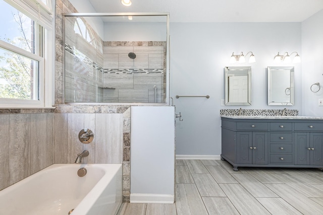 1622 Hickory Valley Rd, Lebanon, TN 37087 - bathroom with healthy amount of natural light, a bath, double vanity, and tiled shower