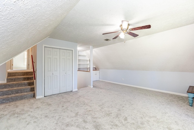 1622 Hickory Valley Rd, Lebanon, TN 37087 - bonus room featuring carpet flooring, a ceiling fan, a textured ceiling, lofted ceiling, and stairs