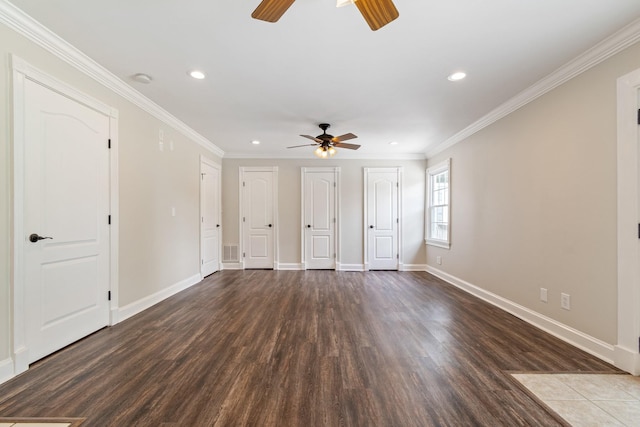 1519 Preston Dr, Nashville, TN 37206 - unfurnished bedroom with recessed lighting, dark wood finished floors, multiple closets, ornamental molding, and a ceiling fan