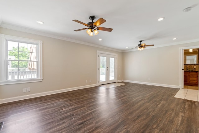 1519 Preston Dr, Nashville, TN 37206 - unfurnished living room featuring plenty of natural light, ceiling fan, wood finished floors, recessed lighting, and ornamental molding