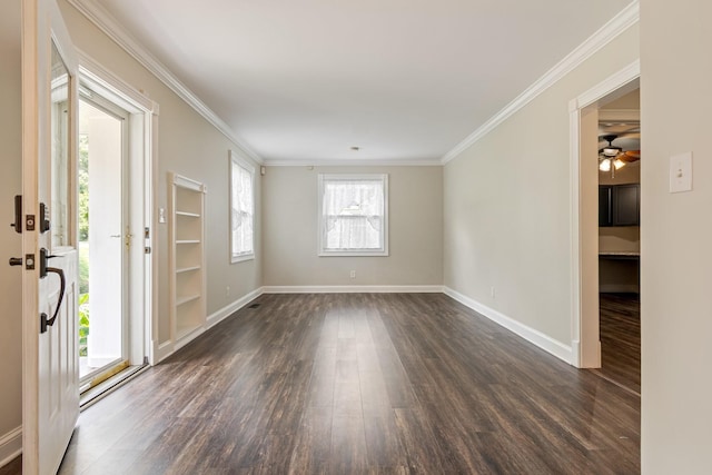 1519 Preston Dr, Nashville, TN 37206 - empty room featuring dark wood-style floors, ornamental molding, and ceiling fan