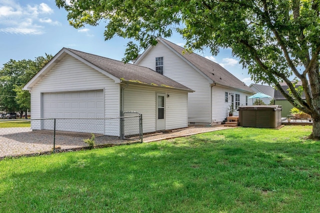 1511 Bridle Ln, Chapel Hill, TN 37034 - rear view of property with a hot tub, roof with shingles, a garage, and an outdoor structure