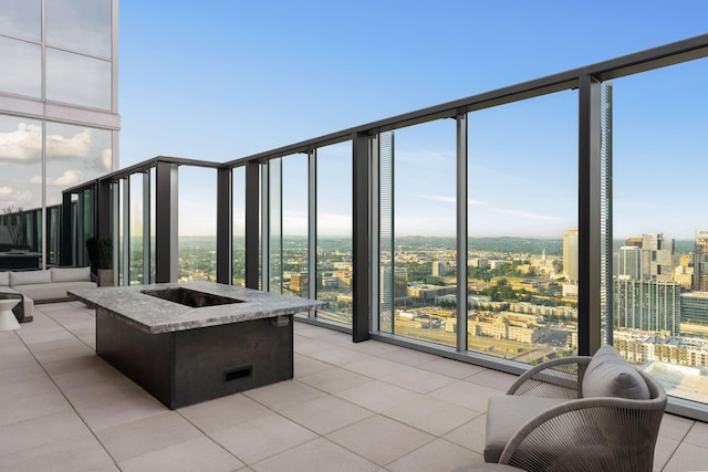 1616 W End Ave Unit 2609, Nashville, TN 37203 - view of patio featuring a fire pit and a city view